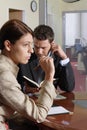 Business man and woman talking in the office