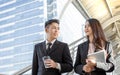 Business man and woman talking and walking together Royalty Free Stock Photo