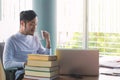 Business man working with laptop computer and documents on his desk at office Royalty Free Stock Photo