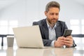 Business man working in office. Businessman in casual suit using laptop in office. Business man office worker in formal Royalty Free Stock Photo