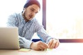 Business man working at office with laptop and documents on his desk Royalty Free Stock Photo