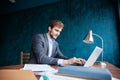 Business man working at office with laptop and documents on his desk, consultant lawyer concept. Royalty Free Stock Photo