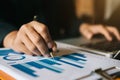 Business man working at office with laptop and documents on his desk, financial adviser analyzing data Royalty Free Stock Photo