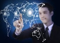 Business man with world map graphic screen Royalty Free Stock Photo