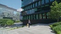 Business manager going upstairs outside office building. Man hurrying on meeting Royalty Free Stock Photo