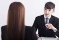 Business manager interviewing young women job applicant in the office Royalty Free Stock Photo