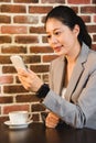 Business manager syncing her smart watch Royalty Free Stock Photo