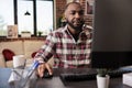 Business manager working on computer at desk Royalty Free Stock Photo