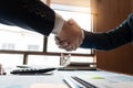 Business Meeting agreement Handshake concept, Hand holding after finishing up dealing project or bargain success at negotiation ov Royalty Free Stock Photo