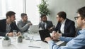 Business meeting. Cheerful men discussing successful contract Royalty Free Stock Photo