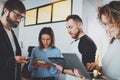 Business meeting concept.Coworkers team working with mobile devices at modern office.Blurred background.Horizontal. Royalty Free Stock Photo