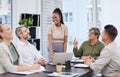 Business meeting, laughing and people with manager, african woman or presenter for company planning. Happy person Royalty Free Stock Photo