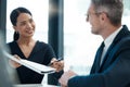 Business meeting, partnership and giving a contract to sign at office. Black woman with documents, paperwork and pen to Royalty Free Stock Photo