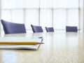 Business meeting Table with Seats Book and Pencil Board room Royalty Free Stock Photo