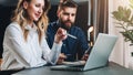 Business meeting. Teamwork. Businesswoman and businessman sitting at table in front of laptop and working. Royalty Free Stock Photo