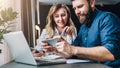 Business meeting. Teamwork. Smiling businesswoman and businessman sitting at table in front of laptop. Distance work. Royalty Free Stock Photo