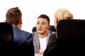 Business meeting-three people sitting and talking