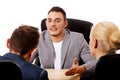 Business meeting-three people sitting and talking