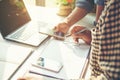 Business meeting time. Photo young account managers crew working with new startup project. Notebook on white table. Idea Royalty Free Stock Photo