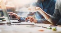 Business meeting time. Photo young account managers crew working with new startup project. Notebook on wood table. Idea Royalty Free Stock Photo