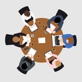 Business meeting top view on brown circle  table conference office team . Royalty Free Stock Photo