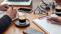 Man and woman work together on a wooden desk. Teamwork, modern business office, close up Royalty Free Stock Photo