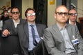 Business men with 3d glasses at exhibition and trade show Royalty Free Stock Photo