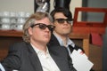 Business men with 3d glasses at exhibition and trade show Royalty Free Stock Photo
