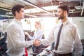 Business men shaking hands after successful meeting. Royalty Free Stock Photo