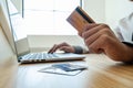 Business men use credit cards and laptops for online shopping and making payments the internet Royalty Free Stock Photo