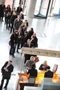 Business men waiting at exhibition and trade show Royalty Free Stock Photo