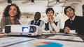 Business men and women Diversity of nationalities are attending the conference room with a smiling face and is projecting the Royalty Free Stock Photo