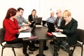 Business men and women at the meeting. Corporate group. Full concentration at work. Group of business people working. Royalty Free Stock Photo