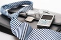 Business mens' accessories tie briefcase phone Royalty Free Stock Photo