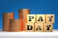 Business metaphor - payday and pile of golden coins