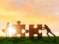 Business metaphor of teamwork with jigsaw puzzle Royalty Free Stock Photo