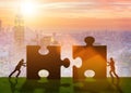 Business metaphor of teamwork with jigsaw puzzle Royalty Free Stock Photo