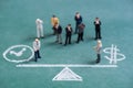 Business miniature people on chalk balance time and money bar ba