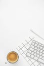 Business mockup. Coffee cup, notebook, pen and keyboard on white background. Work from home. Modern freelancer online