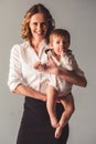 Business mom and baby boy Royalty Free Stock Photo