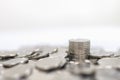 Business, Money, Finance, Security and Saving Concept. Close up of pile and stack of silver coins on white background and copy