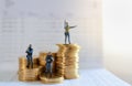 Business, Money and Security Concept. Close up of group of soldier or police miniature figure people standing and guard and