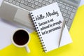 Monday motivational words on a book - Hello Monday. Success is not achieved by strength, but by persistence. With morning coffee.