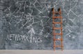 Business network concept with scribble on blackboard and ladder. Innovation,idea,success,human resouces, networking concept