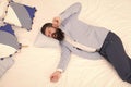 Business never sleeps. Bearded man yawn in business suit. Hipster lying in bed. Business elegant attire. Formalwear and Royalty Free Stock Photo