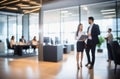 Business office with blurred people casual wear.