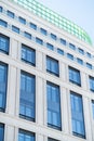 Business office buildings. Low angle photography of glass curtain wall details of high-rise buildings.The window glass reflects