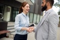 Business and office concept. Businessman and businesswoman shaking hands Royalty Free Stock Photo
