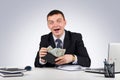 Funny young screaming successful caucasian businessman in black suit holding money Royalty Free Stock Photo