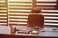 Business office workplace. Sunlight at work place for chief, boss or other employees. Table and comfortable chair. Light through Royalty Free Stock Photo